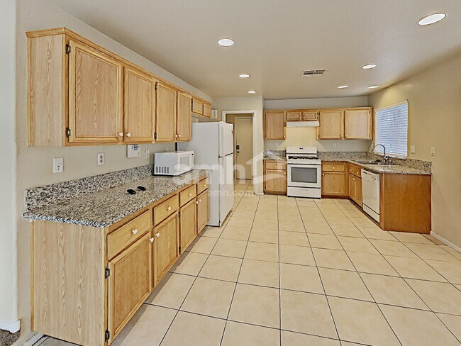 Foto del edificio - 9608 Kelly Creek Ave