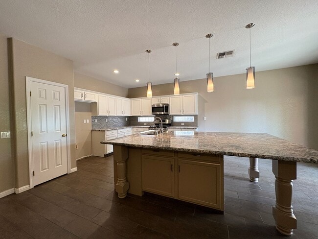 Building Photo - Beautiful, Spacious Home Located in the He...