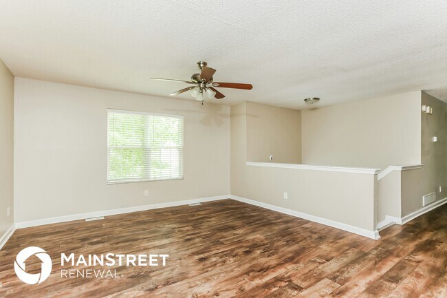 Foto del edificio - 7220 Woodcreek Way