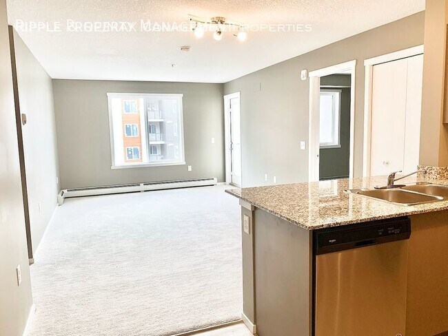 Building Photo - GORGEOUS 2 BED + DEN/ 2 BATH CONDO IN COMMUNITY OF SKYVIEW