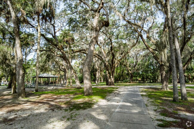 Gemini Springs Park's trails are partially canopied with old oak trees in DeBary.