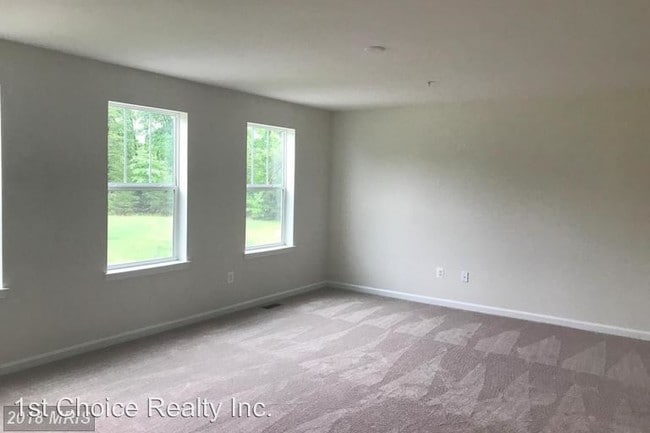 Building Photo - 4 br, 2.5 bath House - 1404 Woodmead Ct