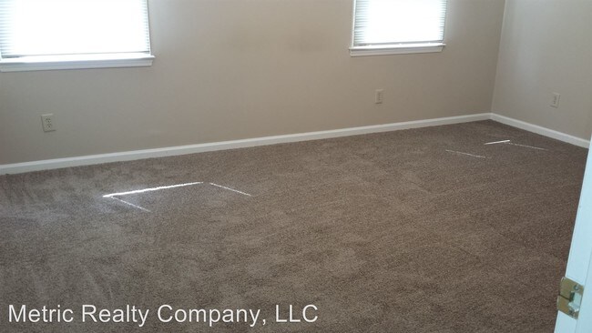 Building Photo - 8443 Coulwood Oak Ln