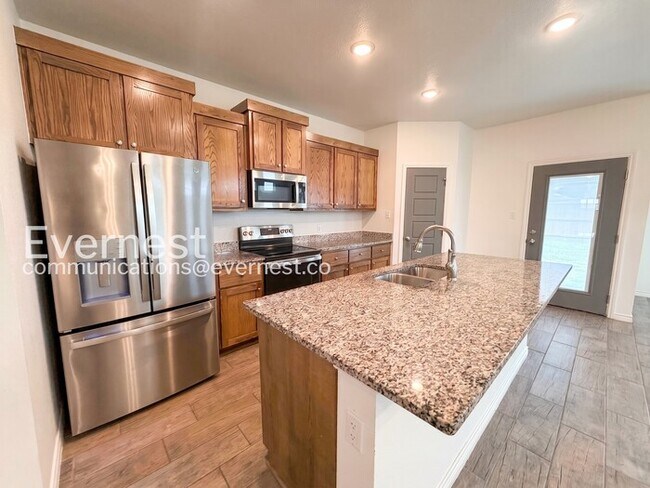 Foto del edificio - Limited Time Special Offer / 4 Bed, 2 Bath Home with Garage / Pet-Friendly / Vouchers Accepted / ...