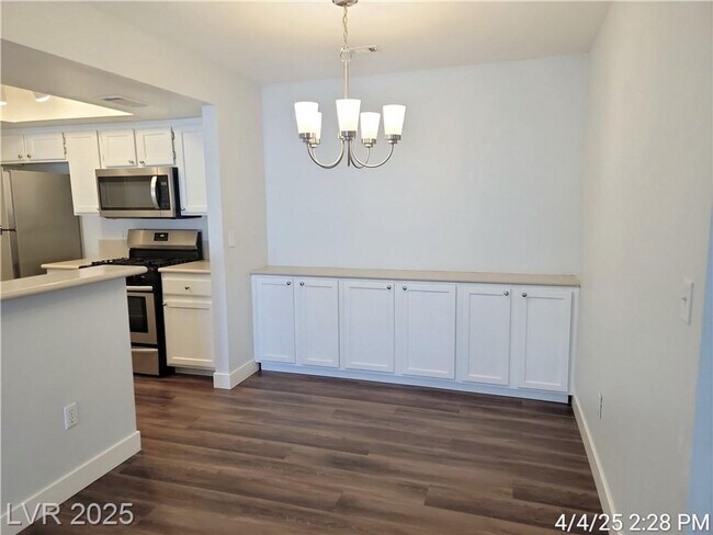 Building Photo - GORGEOUS 2ND FLOOR UNIT LOCATED IN GATED C...