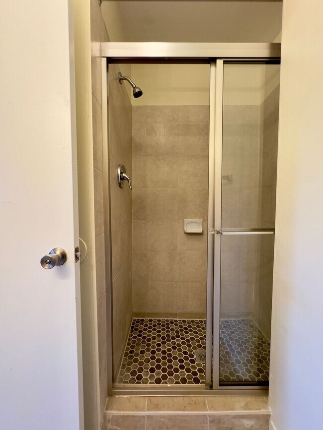 Building Photo - Modern 3-Bedroom Townhome with Spacious Ya...