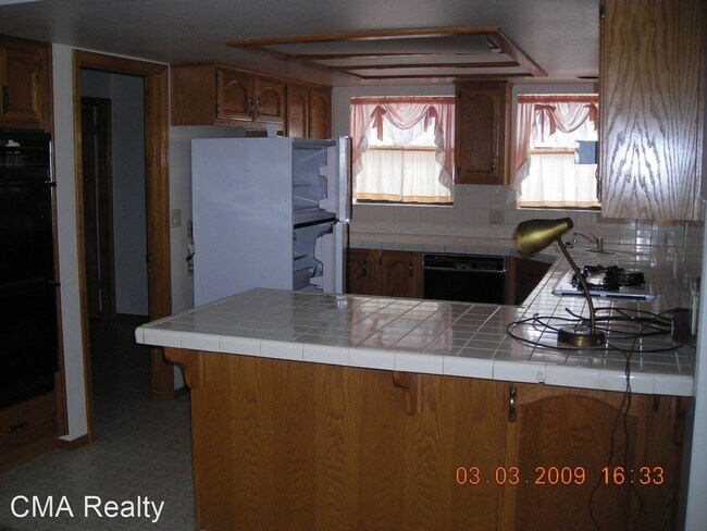 Building Photo - 3 br, 2.5 bath House - 6465 E Sunset Lane