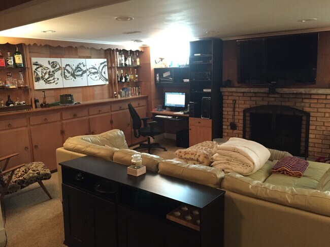 Basement TV Room with builtin desk - 6104 Elliot Ave