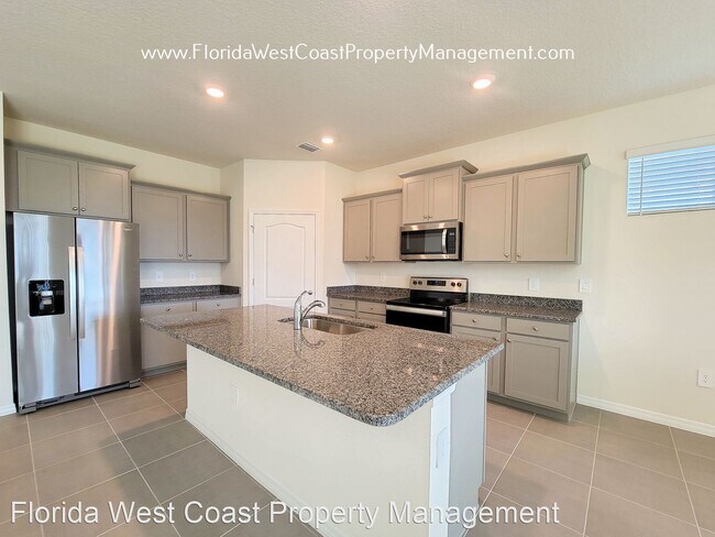 Building Photo - 4 br, 2 bath House - 5715 Oak Bridge Ct