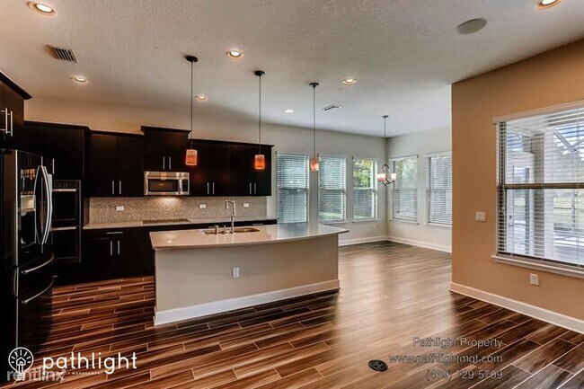 Foto del edificio - 4 br, 3.5 bath House - 710 116th Court Nor...