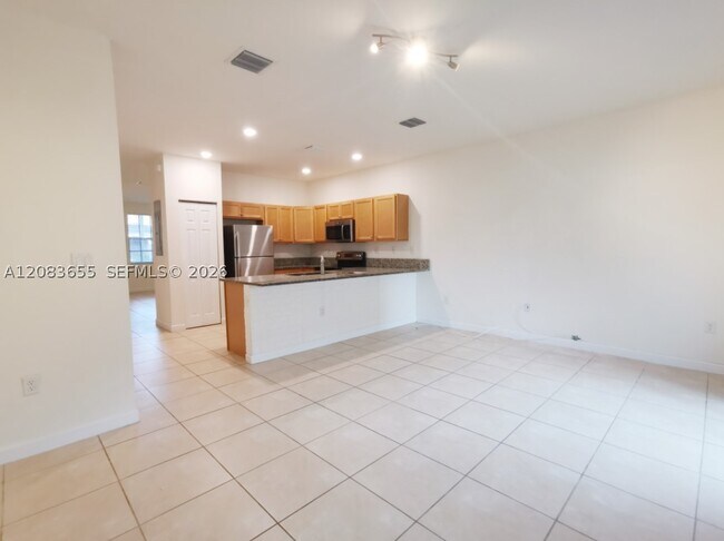 Foto del edificio - 9398 W 32nd Ln