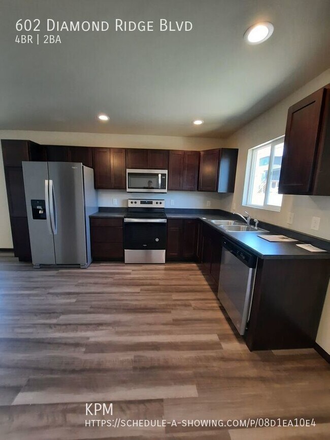 Building Photo - 4 BED | 2 BATH | DOUBLE GARAGE | RAPID VALLEY