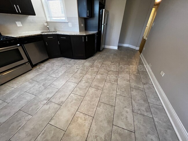 Foto del edificio - 6031 S Eberhart Ave