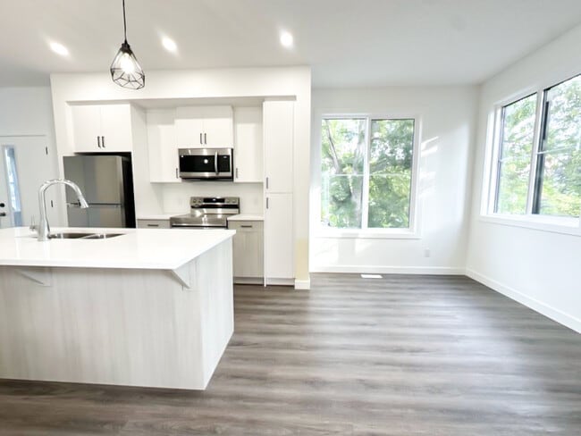 Building Photo - 2439-2426 26 Ave NW