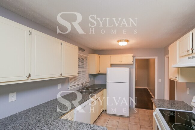 Building Photo - Lease today! No extra charge for contentme...