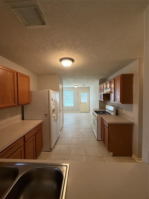 Foto del edificio - 5010 Woodland Meadows Ln