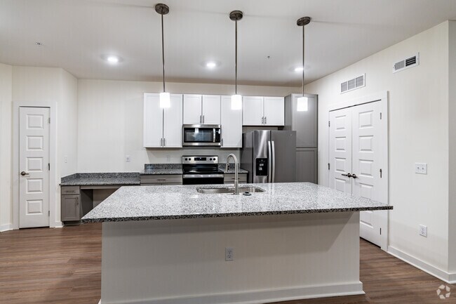 3 habitaciones, 3 baños, 1,267 pies cuadrados, cocina - Sanctuary Bluff Apartments