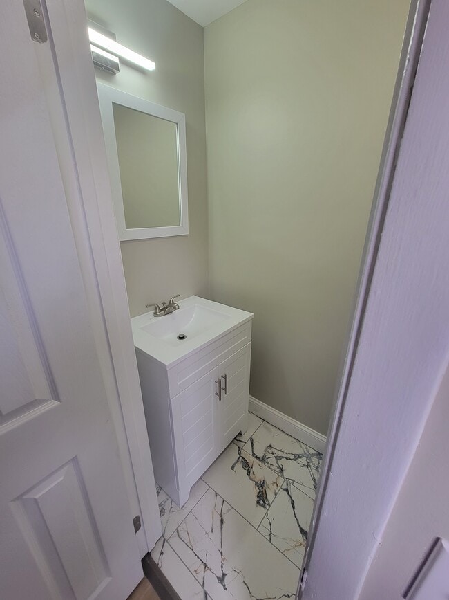 1/2 bath- 1st Floor - 257 Hague St