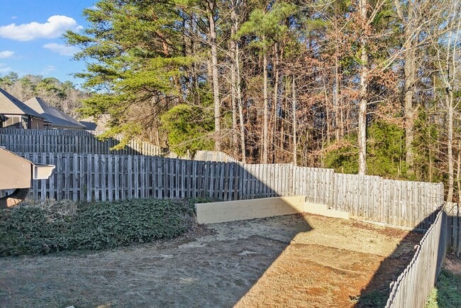 Building Photo - Like-New One-Level Brick Home with Private Patio