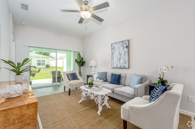 3BR, 2BA - 1,180SF - Living Room - Keys at Wildwood