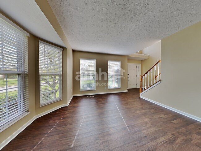 Building Photo - 7316 Pebble Creek