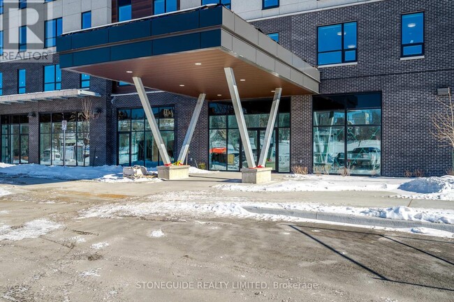 Building Photo - 203-555 BONACCORD St