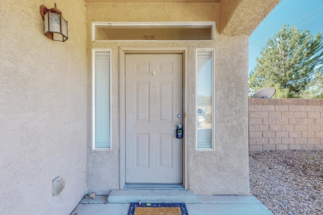 Building Photo - 6568 Los Pueblos Pl NW