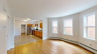 Located at 282 Park Terrace in Hartford, CT, this single-floor residence offers three bedrooms, three full bathrooms, and a thoughtfully arranged layout. Warm hardwood flooring flows throughout the living areas and bedrooms, lending a classic and cohesive character to the space. The living room is highlighted by a graceful bay window arrangement that floods the room with natural light and offers views of the surrounding neighborhood. Adjacent to the living area, the well-appointed kitchen features warm oak cabinetry, granite-style countertops, and a full suite of stainless steel appliances including a refrigerator, electric range, and hood vent — all complemented by tile flooring and ample storage. The three bedrooms are painted in a soothing slate-blue palette, each with hardwood floors, generous windows for natural light, and access to closet space. The bathrooms are cleanly finished with granite-topped wood vanities and neutral tile flooring; one features a full tub-shower combination. Additional highlights include a dedicated laundry area, multiple closets throughout, and a hallway connecting the rooms efficiently. Baseboard heating is present throughout, ensuring comfort year-round in this well-maintained Hartford residence.