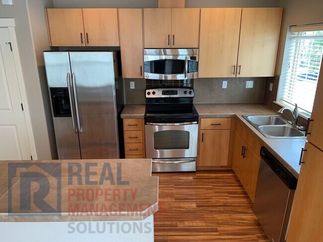 Building Photo - 8750 NE Delamere Way