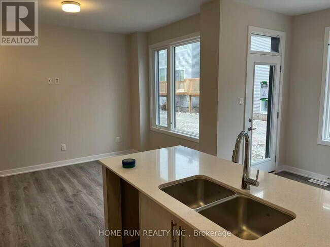 Building Photo - 379 Les Emmerson Dr