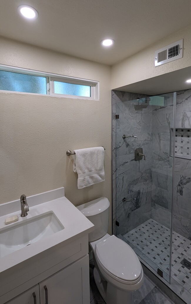 remodeled bathroom 2 with marble - 21500 Califa St