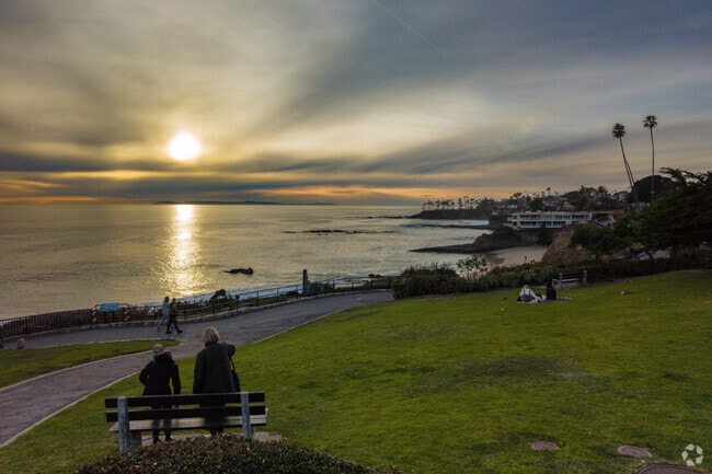 Parks have fields and benches where residents can sit and watch the sunset.