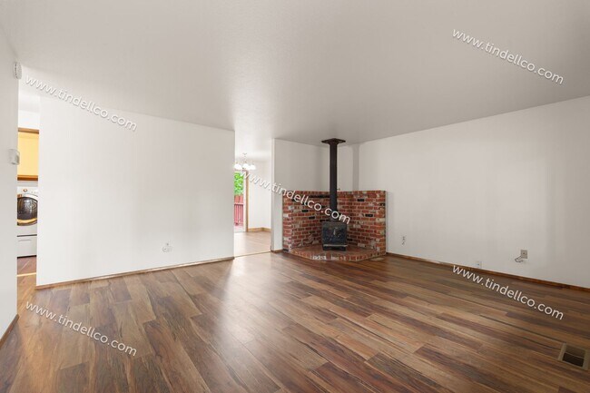 Building Photo - Private Cully Neighborhood 3 Bedroom 2 Bathroom Home - Attached Garage & Fenced Yard!