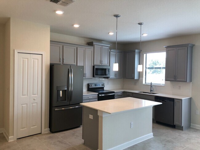 Foto del edificio - Champions Gate 3 bed 2.5 bath Town home 12...