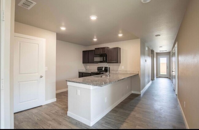 Foto del edificio - Exclusive Bell Farms Townhomes