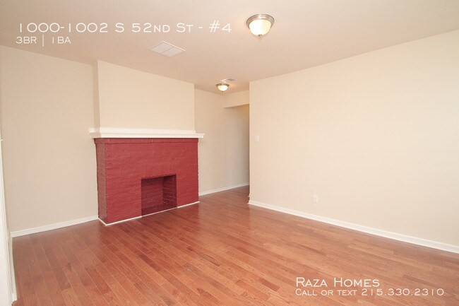 Building Photo - 1000-1002 S 52nd St #4