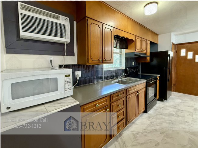 Foto del edificio - Charming 2-Bedroom Brick Duplex in a Prime...