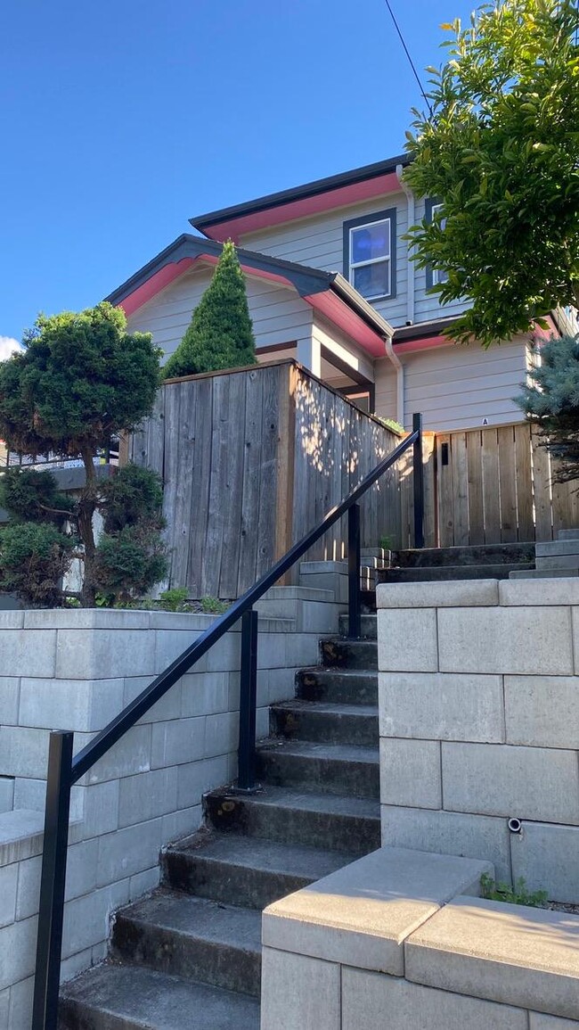 exterior stairway shared by house and adu - 2505 SE Ash St