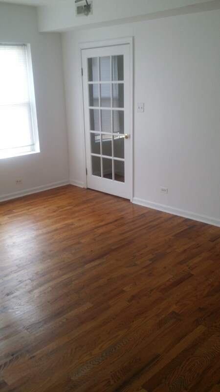 Building Photo - 1301 E 71st Pl