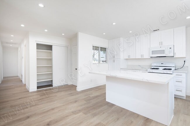 Building Photo - Spacious 4 Bedroom, 2 Bath Home with Priva...