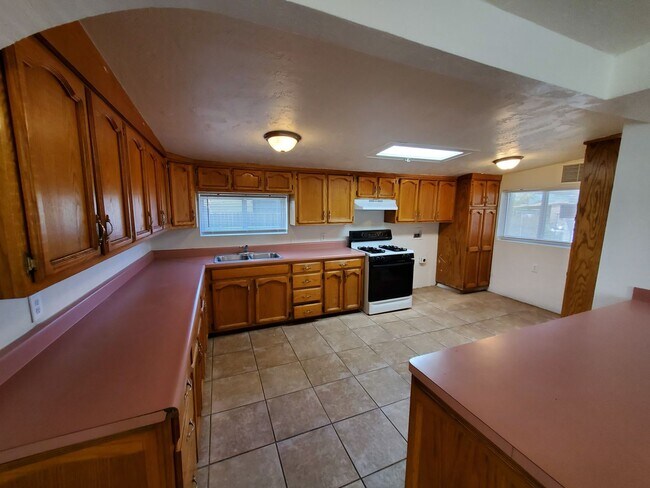 Photo - 4 bedrooms and 2 bathrooms with A/C. House