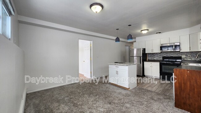 Building Photo - 1201-11 1/2 11 1/2 St N