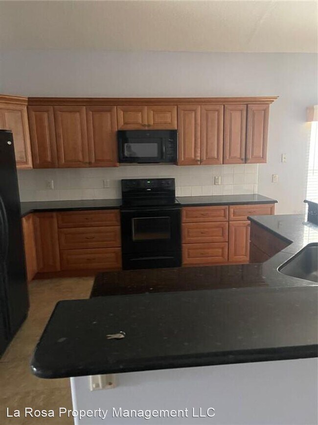 Foto del edificio - 4 br, 2.5 bath House - 14081 PORTRUSH DR