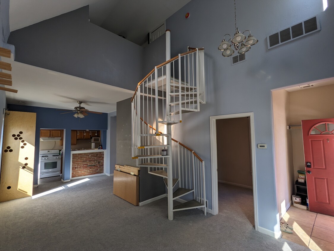 Entry/living space, bar, staircase - 2437 N Clay St