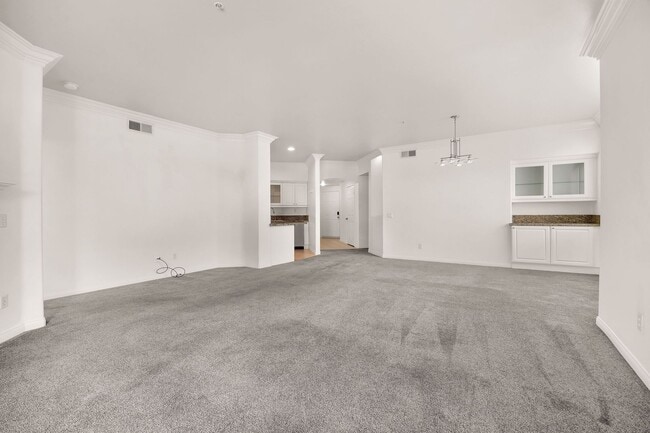 Building Photo - Gorgeous 3rd Floor Corner Unit in Summit Village Condominiums!
