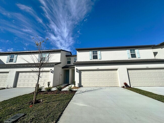 Building Photo - Your BRAND NEW Watergrass townhome is read...