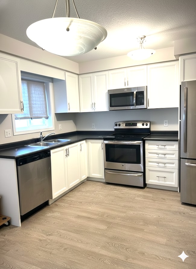 Building Photo - 388-388 Old Huron Rd