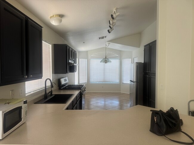 kitchen with breakfast nook - 3072 N 87th St