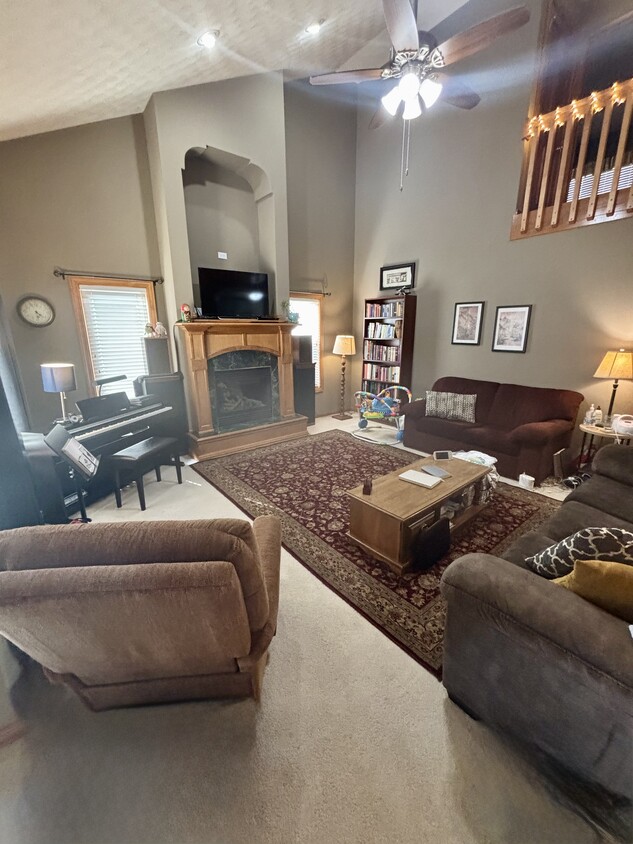 Large living room with gas fireplace - N9689 Hopfensperger Rd