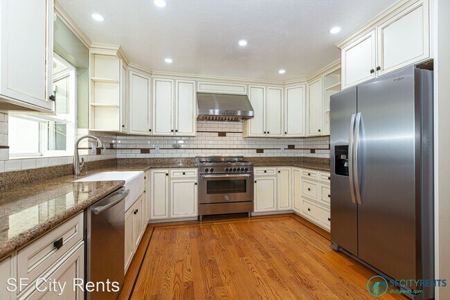 Building Photo - 4 br, 3.5 bath House - 312 Harvard St.